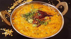 A very satisfying dal, yellow lentils tempered with cumin, mus tard seed, red chilies and cilantro